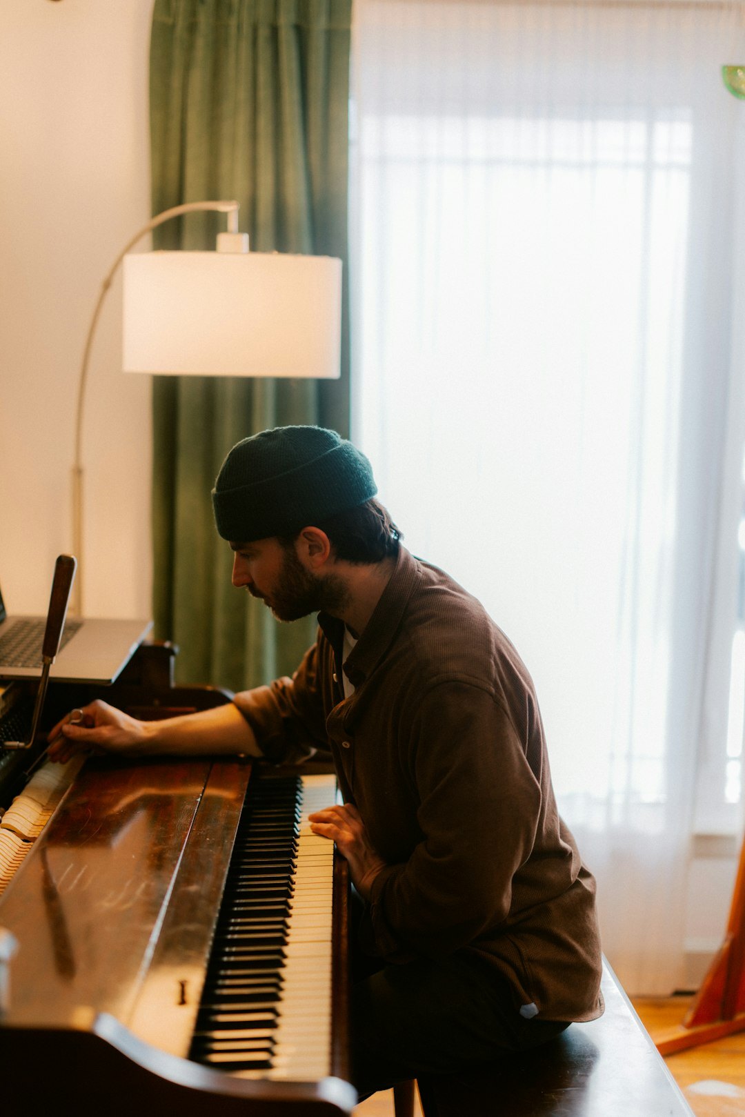 film composer at piano