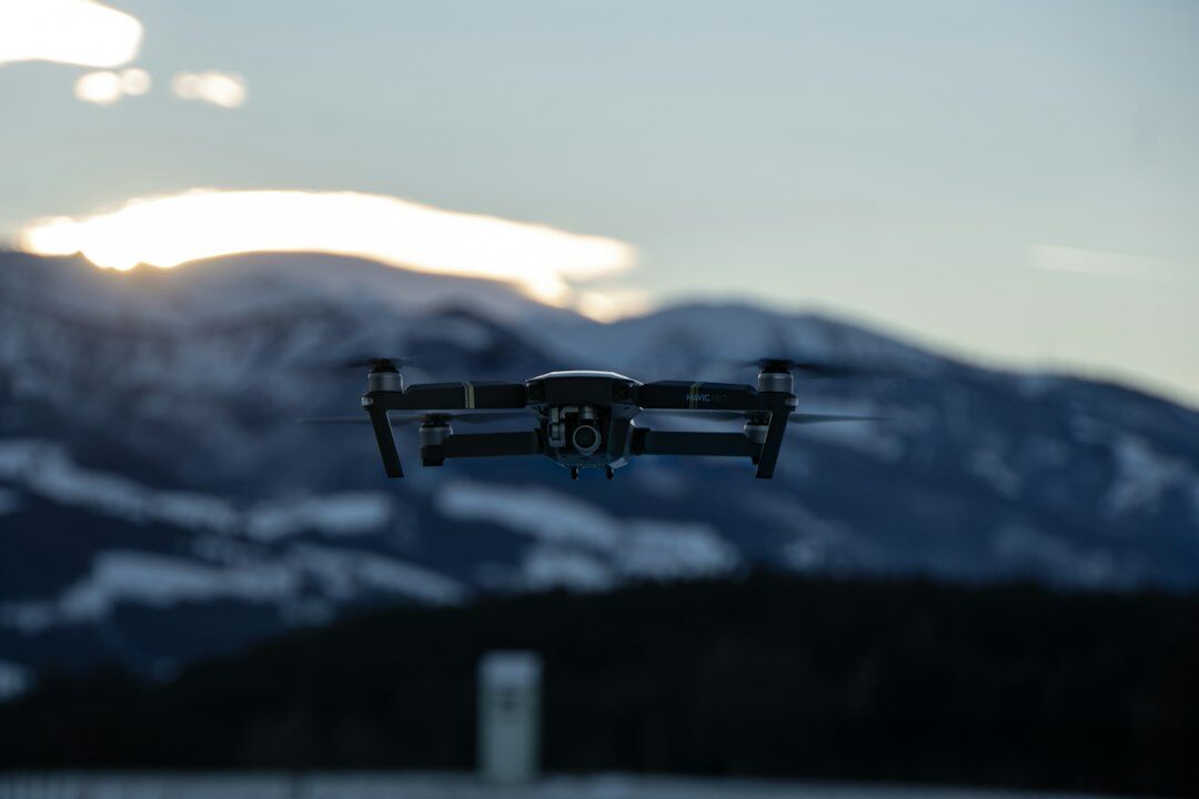 drone flying over mountains